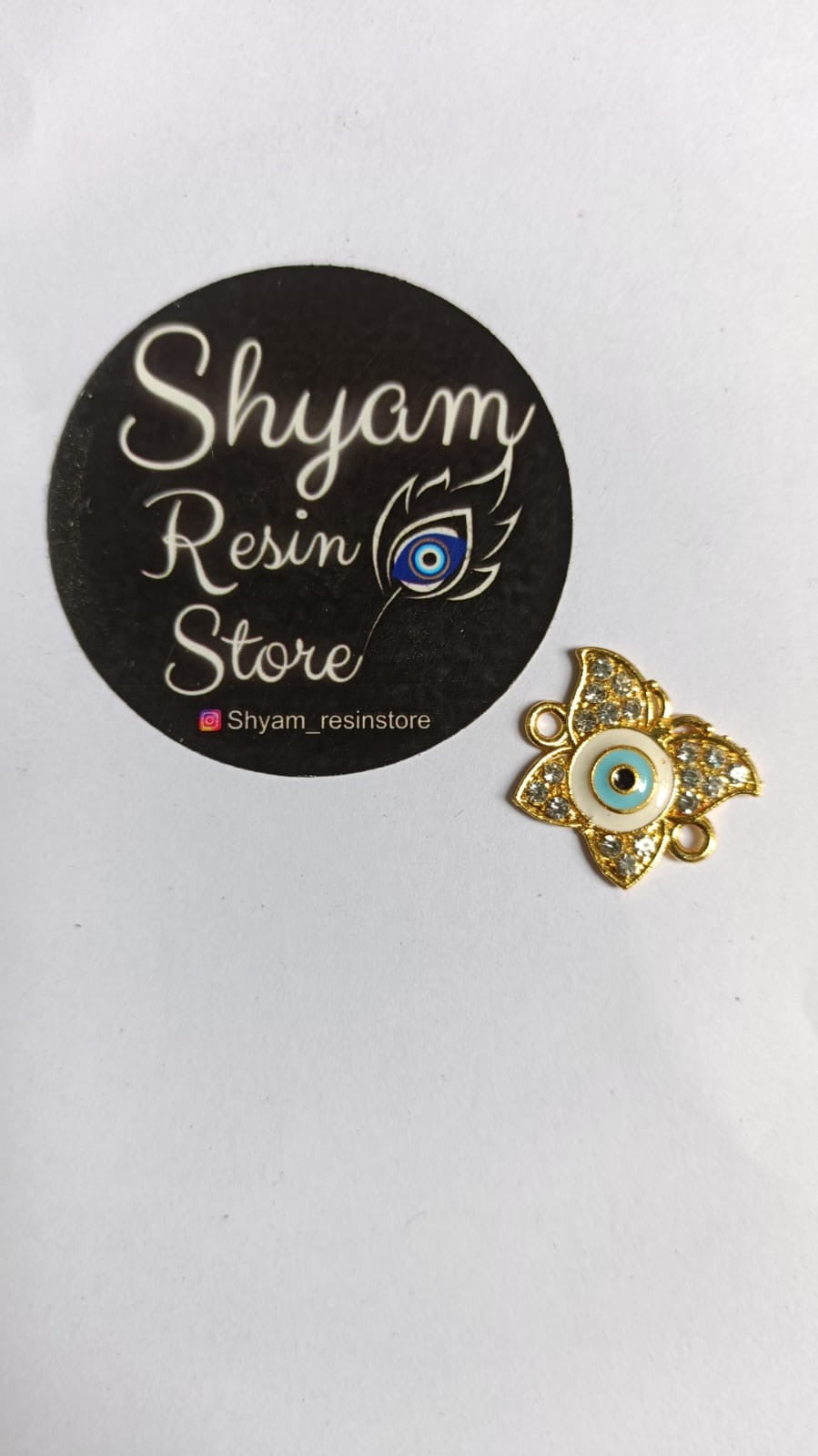 Butterfly shape evil eye charm